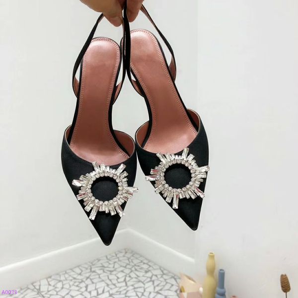 the new women's shoes with tapered heels come in a sleek black and silver with buckled cowhand rhinestones
the new women's shoes with tapered heels come in a sleek black and silver with buckled cowhand rhinestones