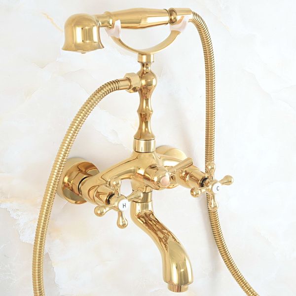 the faucet of the luxurious golden brass bathtub is hung on wall, faucet of bathroom faucet, and hand shower
the faucet of the luxurious golden brass bathtub is hung on wall, faucet of bathroom faucet, and hand shower