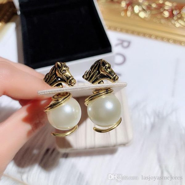 new ins trendy fashion designer luxury pearl vintage little horse front back stud earrings for woman girls, Golden;silver
new ins trendy fashion designer luxury pearl vintage little horse front back stud earrings for woman girls, Golden;silver