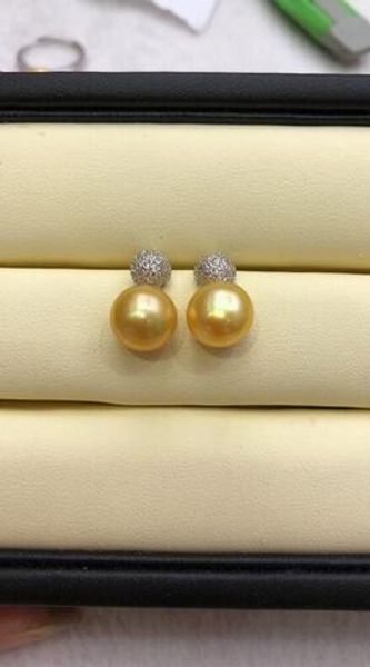 elegante 9-10mm mar del sur plana redonda de oro pendiente de la perla 925 s, White
elegante 9-10mm mar del sur plana redonda de oro pendiente de la perla 925 s, White