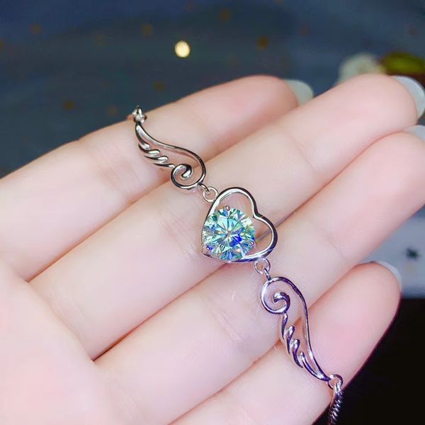 dazzling colourful moissanite bracelet with silver angel feather shape, Golden;silver
dazzling colourful moissanite bracelet with silver angel feather shape, Golden;silver