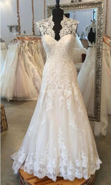 vintage lace wedding dresses v neck hollow back appliques sweep train plus size garden a line bridal gowns custom made, White
vintage lace wedding dresses v neck hollow back appliques sweep train plus size garden a line bridal gowns custom made, White
