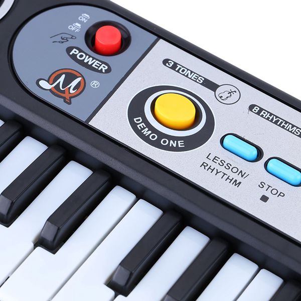 37 keys electronic organ digital piano keyboard with microphone kids toys stave music toy develop child's talents
37 keys electronic organ digital piano keyboard with microphone kids toys stave music toy develop child's talents
