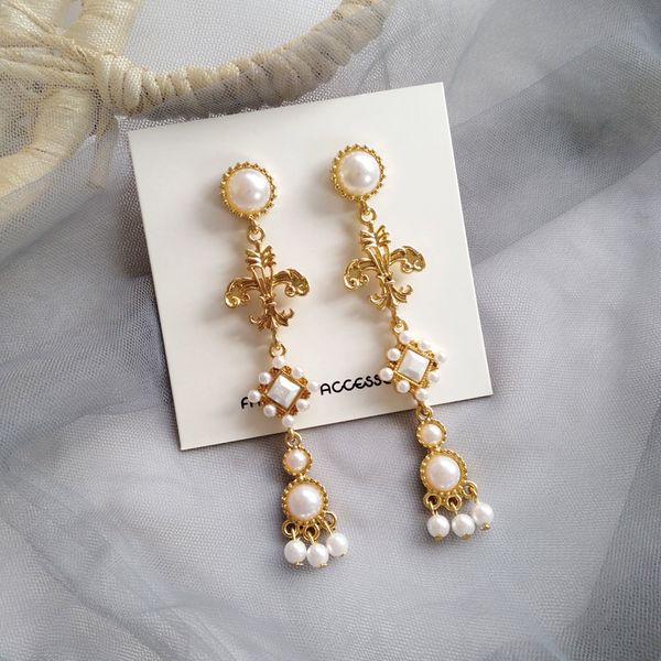 vintage baroque court style exquisite imitation pearl cross long tassel earrings temperament fashion ladies jewelry accessories, Silver
vintage baroque court style exquisite imitation pearl cross long tassel earrings temperament fashion ladies jewelry accessories, Silver