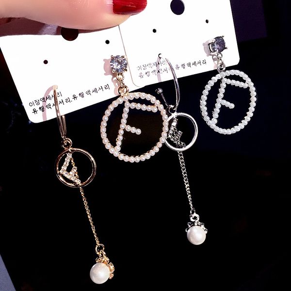 2020 designer luxury korean new earrings pearl micro-set letters asymmetric personality wild net red earrings earrings female, Silver
2020 designer luxury korean new earrings pearl micro-set letters asymmetric personality wild net red earrings earrings female, Silver