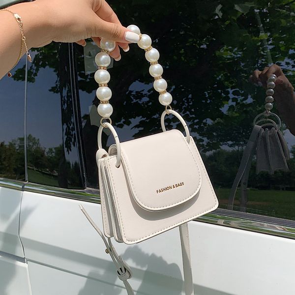 mini flip pearl tote bag 2020 summer new quality pu leather women's designer handbag travel shoulder messenger bag lipstick
mini flip pearl tote bag 2020 summer new quality pu leather women's designer handbag travel shoulder messenger bag lipstick
