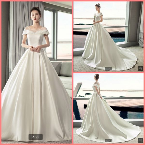 2020 vintage a line white satin wedding dress cap sleeve floor length hollow back corset bridal gowns court train long bride dresses on sale
2020 vintage a line white satin wedding dress cap sleeve floor length hollow back corset bridal gowns court train long bride dresses on sale