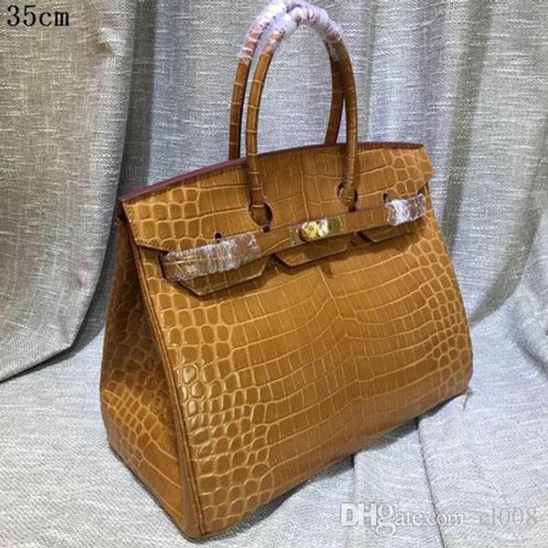 women leather totes 100% genuine leather crocodile grain shiny leather with strap dustbag and card more economic handbags
women leather totes 100% genuine leather crocodile grain shiny leather with strap dustbag and card more economic handbags