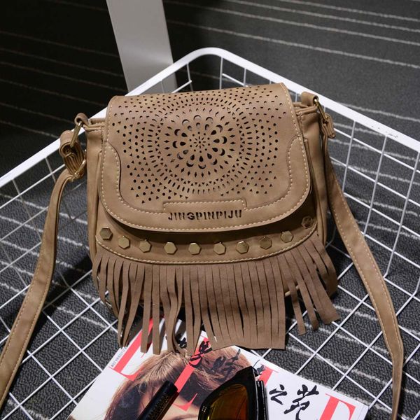 women vintage tassel rivet handbag hollow out messenger saddle shoulder bag dames tassen #t2g
women vintage tassel rivet handbag hollow out messenger saddle shoulder bag dames tassen #t2g