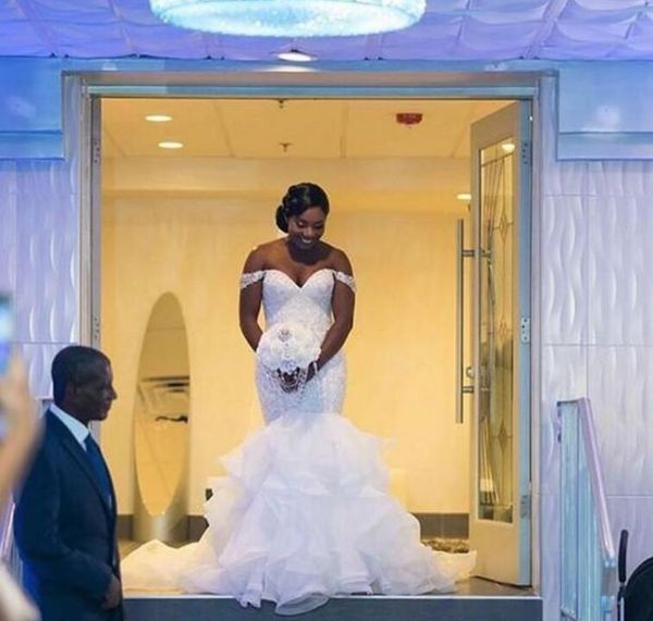 saudi african mermaid wedding dresses off the shoulder lace beaded cascading ruffles wedding bridal gowns plus size wedding dress, White
saudi african mermaid wedding dresses off the shoulder lace beaded cascading ruffles wedding bridal gowns plus size wedding dress, White