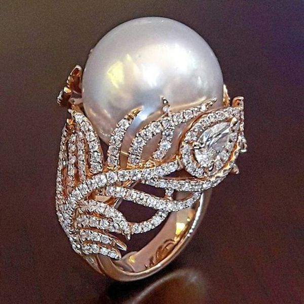 angel wing feather design long full finger ring luxury simulated pearl cubic zirconia women wedding engagement party ring y3p038, Golden;silver
angel wing feather design long full finger ring luxury simulated pearl cubic zirconia women wedding engagement party ring y3p038, Golden;silver
