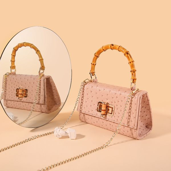 women fashion handbag ostrich grain soft pu leather pure color bamboo joint handle tote crossbody shoulder bag style
women fashion handbag ostrich grain soft pu leather pure color bamboo joint handle tote crossbody shoulder bag style