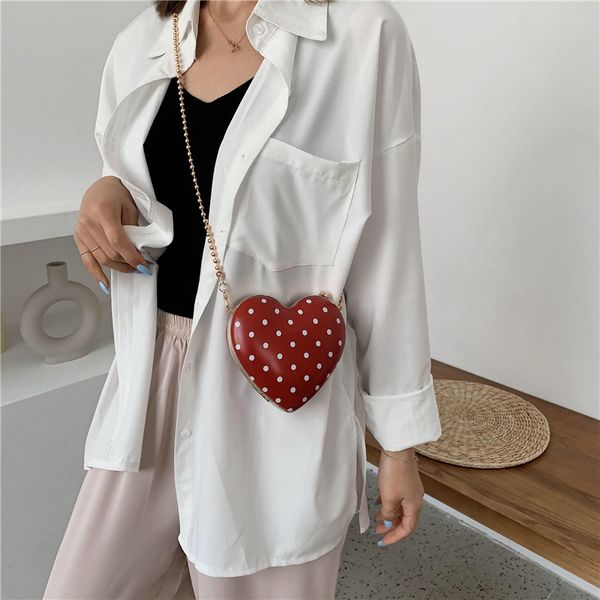 2020 new women's shoulder bag fashion messenger bag western chain portable mini cute heart-shaped wave point
2020 new women's shoulder bag fashion messenger bag western chain portable mini cute heart-shaped wave point