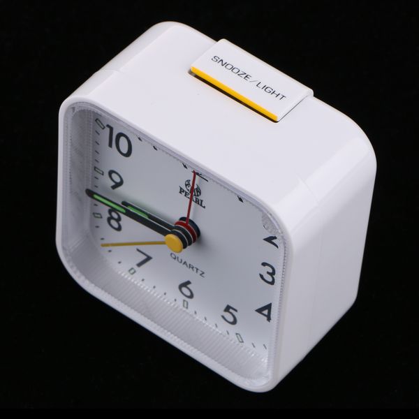 battery operated travel alarm clock,lighted on demand and snooze 
battery operated travel alarm clock,lighted on demand and snooze