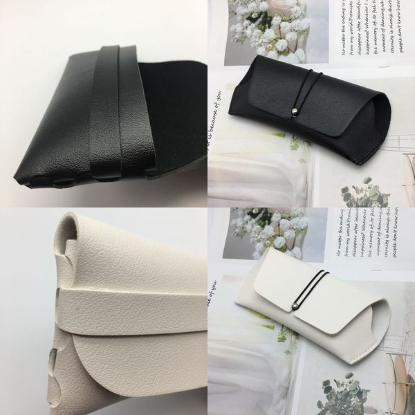 black and white handmade leather soft bag glasses case glasses case handmade leather bag
black and white handmade leather soft bag glasses case glasses case handmade leather bag