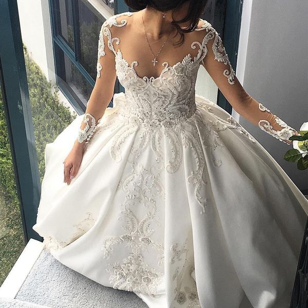 white long sleeve elegant wedding dresses with floral applique sheer neck bridal party gown robes de mariee wedding gown
white long sleeve elegant wedding dresses with floral applique sheer neck bridal party gown robes de mariee wedding gown