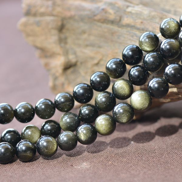 joanlyn grade a natural gold obsidian beads not dyed 4mm-20mm smooth polished round 15 inch strand ob12
joanlyn grade a natural gold obsidian beads not dyed 4mm-20mm smooth polished round 15 inch strand ob12