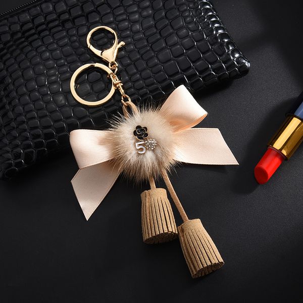 keychain bow knot key chain with mink fur ball gifts for women car bag accessories keyring holder, Silver
keychain bow knot key chain with mink fur ball gifts for women car bag accessories keyring holder, Silver