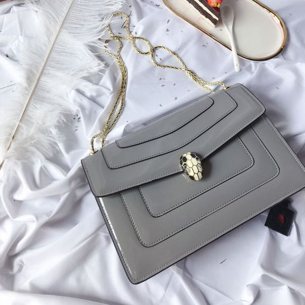 TS лакированная кожа змея логотип диагональный крест сумка уличная мода женская д 
TS лакированная кожа змея логотип диагональный крест сумка уличная мода женская д