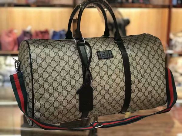 New fa hion men women travel bag duffle bag luggage handbag european and american fa hion large capacity port bag