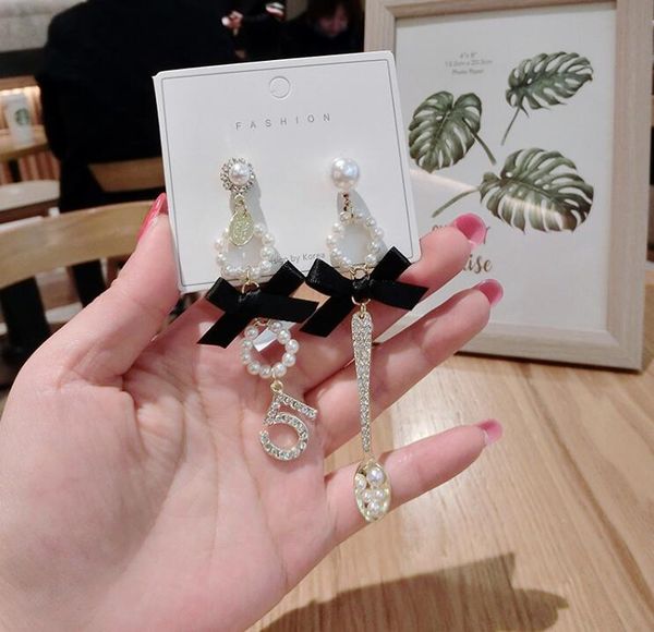 dangle & chandelier silver needle classic women bow 5 simple asymmetric stud earrings soup spoon lace pearl rhinestone ear accessories
dangle & chandelier silver needle classic women bow 5 simple asymmetric stud earrings soup spoon lace pearl rhinestone ear accessories
