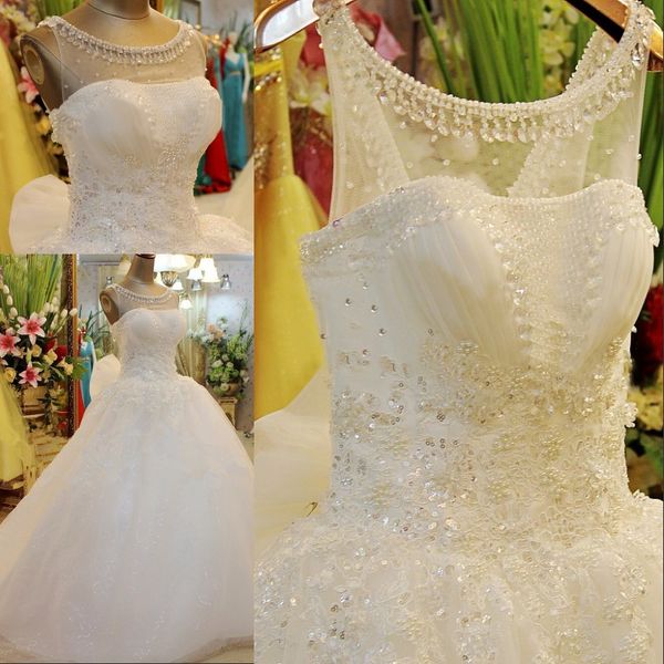 custom made ball gown fluffy tulle lace crystal sequins luxury wedding dress real p jewel sheer neck big bow bridal gown, White
custom made ball gown fluffy tulle lace crystal sequins luxury wedding dress real p jewel sheer neck big bow bridal gown, White