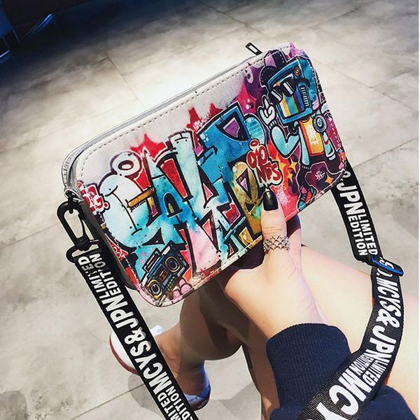 women's new messenger bag popular ethnic style graffiti shoulder bag fashion wide shoulder strap small square
women's new messenger bag popular ethnic style graffiti shoulder bag fashion wide shoulder strap small square