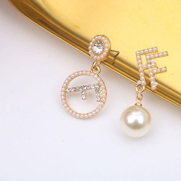 2020 designer luxury fashion rhinestone pearl asymmetric temperament letter earrings earrings personalized net red trendy female, Silver
2020 designer luxury fashion rhinestone pearl asymmetric temperament letter earrings earrings personalized net red trendy female, Silver