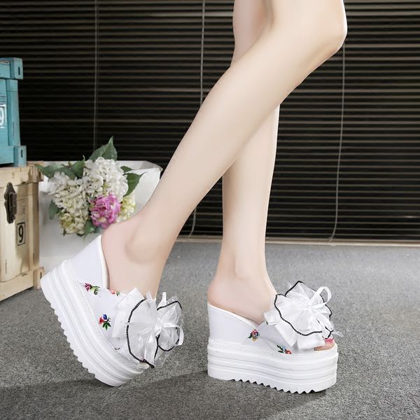 new korean female slippers student muffin thick-soled slippers fashion bow super high with 12 cm, Black
new korean female slippers student muffin thick-soled slippers fashion bow super high with 12 cm, Black