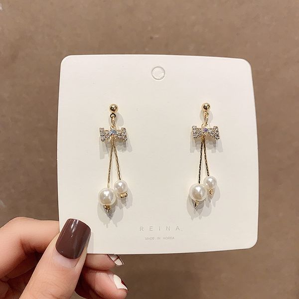 925 silver needle japanese harajuku style fresh shiny crystal bow pendant earrings semi-circular c-shaped pearl women's jewelry
925 silver needle japanese harajuku style fresh shiny crystal bow pendant earrings semi-circular c-shaped pearl women's jewelry
