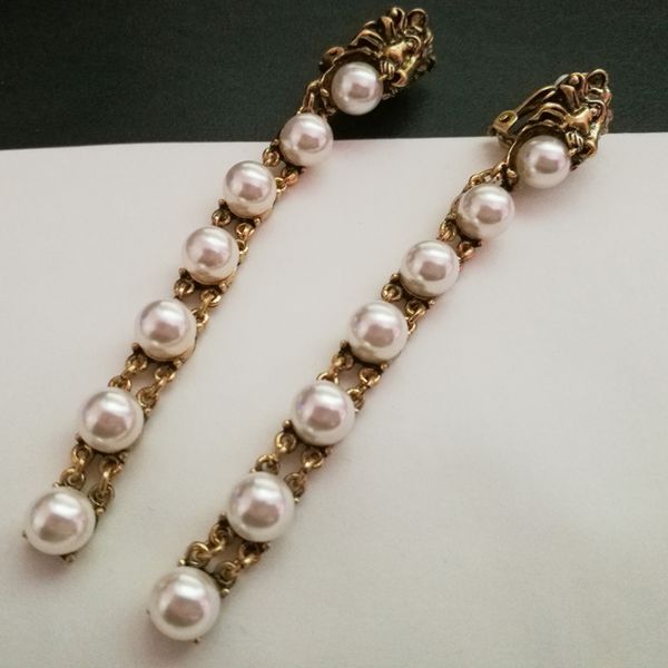 fashion-e vintage metal lion head clip earrings for women fashion jewelry 2017 pearl earrings pendant bridal brincos ear cuff female clips, Silver
fashion-e vintage metal lion head clip earrings for women fashion jewelry 2017 pearl earrings pendant bridal brincos ear cuff female clips, Silver
