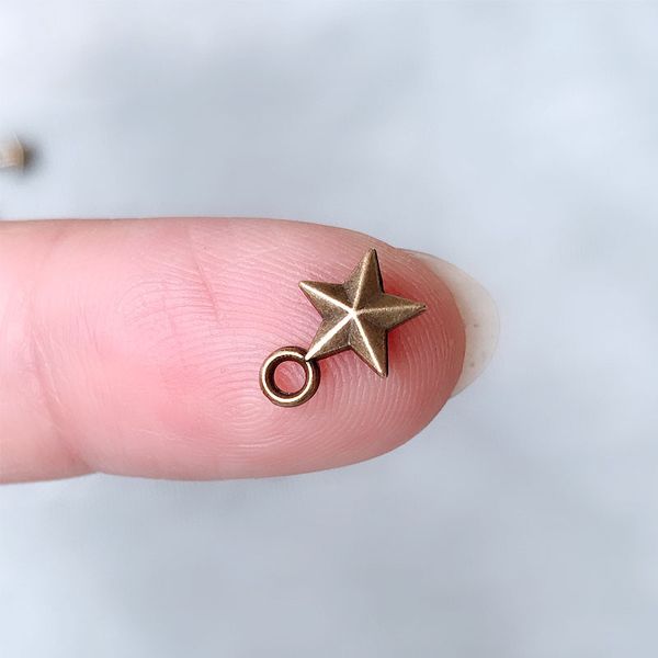 30pcs/lot 8mm antique bronze mini stars pendants for necklace earrings bracelet jewelry making diy ornaments accessories, Blue;slivery
30pcs/lot 8mm antique bronze mini stars pendants for necklace earrings bracelet jewelry making diy ornaments accessories, Blue;slivery