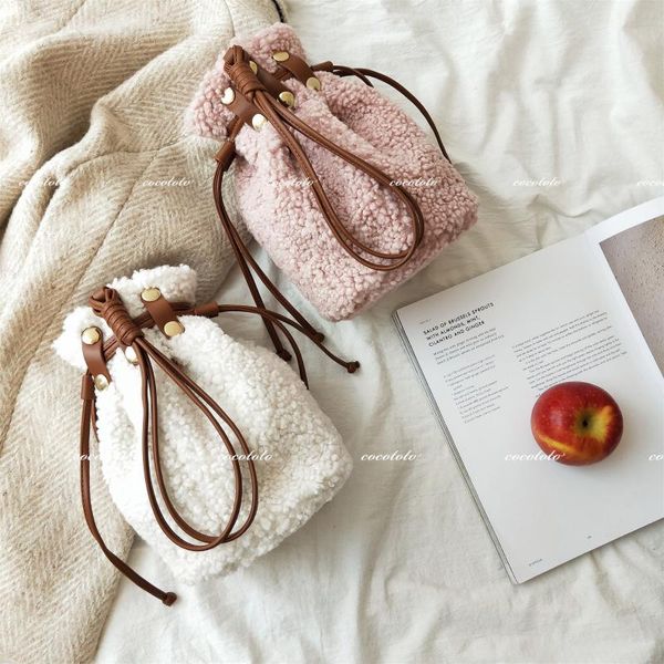 imitation lamb fur drawstring bucket bag cool solid color furry messenger bag
imitation lamb fur drawstring bucket bag cool solid color furry messenger bag
