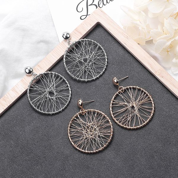 europe and america exaggeration sense of design geometry dreamcatcher hollow out interleaving circle pearl earrings metal earrin, Silver
europe and america exaggeration sense of design geometry dreamcatcher hollow out interleaving circle pearl earrings metal earrin, Silver