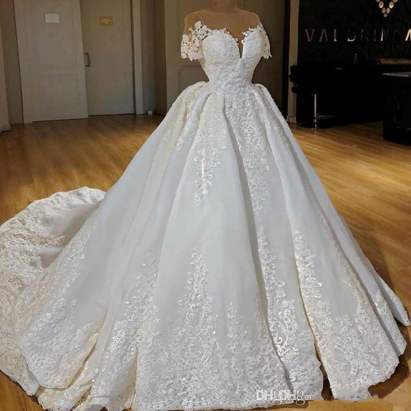 2019 arabic short sleeves lace ball gown wedding dresses tulle applique ruched sweep train plus size bridal wedding gowns robe de mariée, White
2019 arabic short sleeves lace ball gown wedding dresses tulle applique ruched sweep train plus size bridal wedding gowns robe de mariée, White