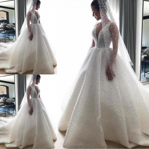 white full beading wedding dresses deep v neck sleeveless a line bridal gowns pearls beaded sweep train wedding vestidos custom made
white full beading wedding dresses deep v neck sleeveless a line bridal gowns pearls beaded sweep train wedding vestidos custom made