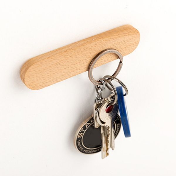creative design solid wood key holder wall hanging magnetic hook multi-function magnet suction on the wall
creative design solid wood key holder wall hanging magnetic hook multi-function magnet suction on the wall