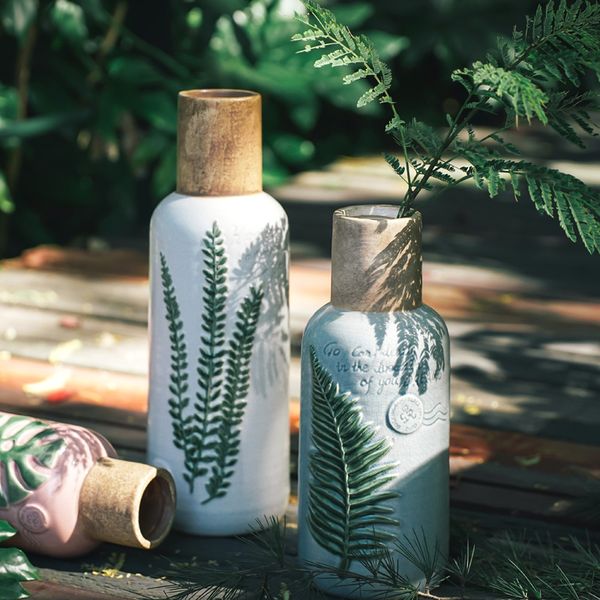 creative household ceramic flower arrangement vase for garden tower leaves living room household jewelry
creative household ceramic flower arrangement vase for garden tower leaves living room household jewelry