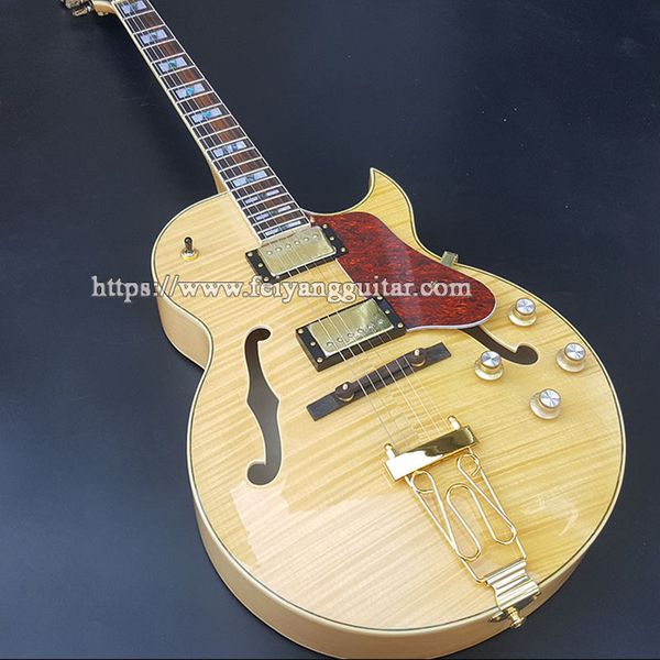 custom jazz electric guitar, fixation pull string board and gold fittings, semi hollow body archguitar
custom jazz electric guitar, fixation pull string board and gold fittings, semi hollow body archguitar