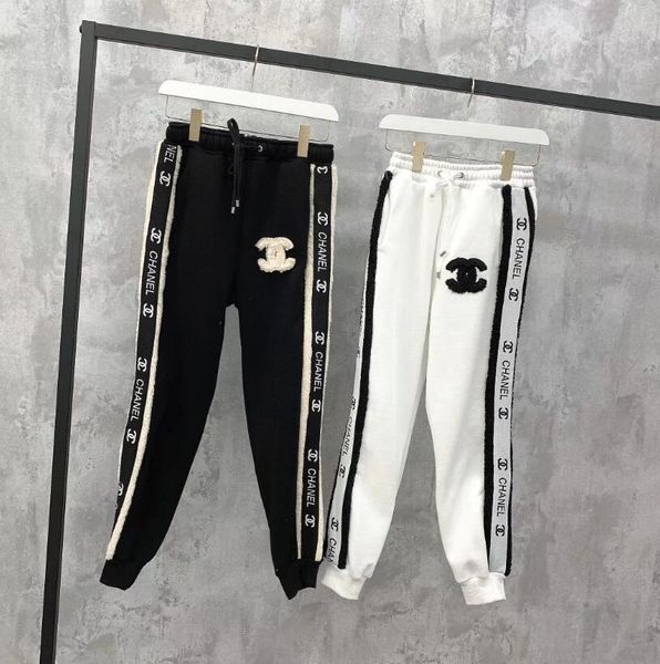 high end women girls jogging pants elastic waist belt letter striped casual slim pencil legging milan runway fashion design luxury trousers, Black;white
high end women girls jogging pants elastic waist belt letter striped casual slim pencil legging milan runway fashion design luxury trousers, Black;white