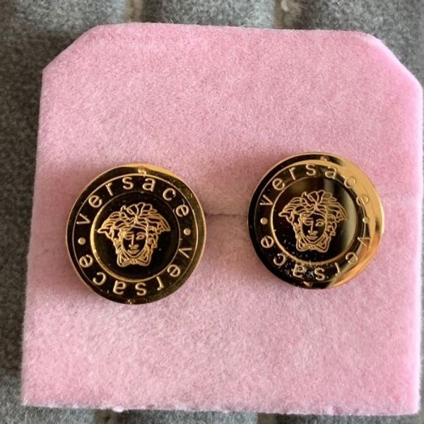 New fa hion gold tud ear ring for men women golden color round head punk earring for party wedding gift whole ale ear jewelry
New fa hion gold tud ear ring for men women golden color round head punk earring for party wedding gift whole ale ear jewelry