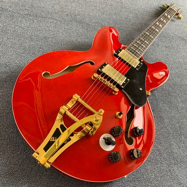 custom 335 transparent red semi hollow jazz electric guitar tremolo system gold black pickguard rosewood fingerboard 190318
custom 335 transparent red semi hollow jazz electric guitar tremolo system gold black pickguard rosewood fingerboard 190318