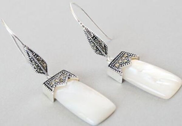 noble white silver shell and macasite earrings