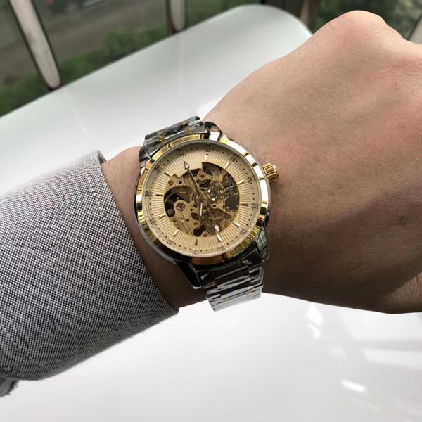 a grade simple three-pin hollow design leisure business men's watch automatic mechanical crystal mirror, Slivery;brown
a grade simple three-pin hollow design leisure business men's watch automatic mechanical crystal mirror, Slivery;brown