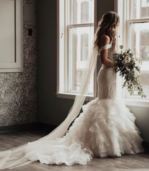white simple plus size off the shoulder mermaid wedding dress with tiered ruffles skirts bridal gowns covered button trumpet wedding dress
white simple plus size off the shoulder mermaid wedding dress with tiered ruffles skirts bridal gowns covered button trumpet wedding dress