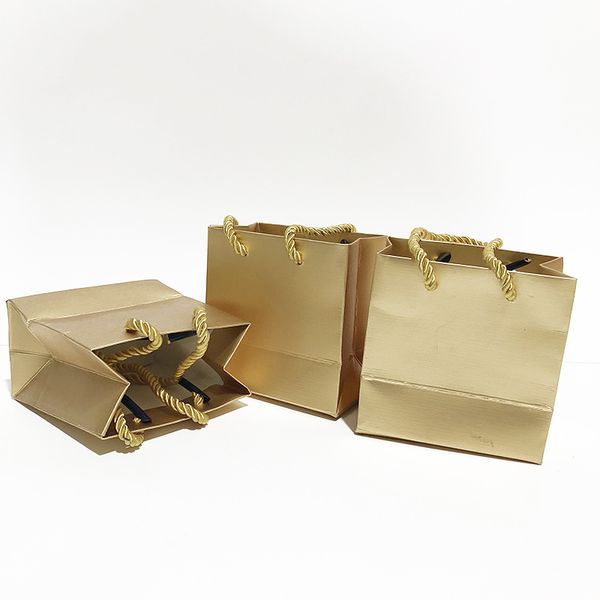 gold paper gift bags with handles jewellery package bags wedding present party favor wrap supplies
gold paper gift bags with handles jewellery package bags wedding present party favor wrap supplies