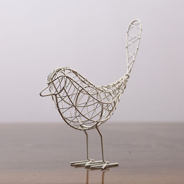 creative iron hollow out bird shaped ornament metal craft desk home decor 
creative iron hollow out bird shaped ornament metal craft desk home decor