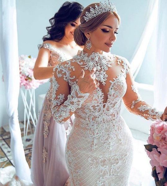 champagne arabic dubai new mermaid wedding dresses high neck illusion long sleeves lace appliques crystal beads button back bridal gowns, White
champagne arabic dubai new mermaid wedding dresses high neck illusion long sleeves lace appliques crystal beads button back bridal gowns, White