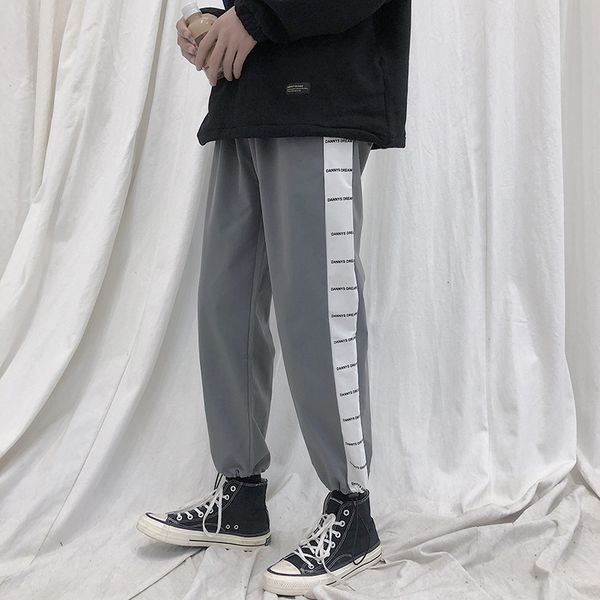 2019 autumn and winter new neutral korean version of the couple personality printing side tube casual sweatpants joggers, Black
2019 autumn and winter new neutral korean version of the couple personality printing side tube casual sweatpants joggers, Black