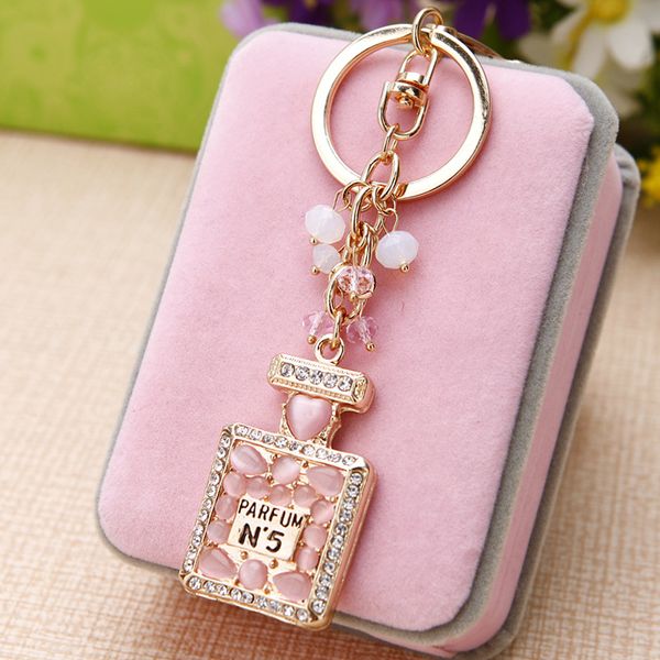 new crystal rhinestone perfume bottle keychain fashion gold keychain keyring car ladies jewelry bag pendant gift, Silver
new crystal rhinestone perfume bottle keychain fashion gold keychain keyring car ladies jewelry bag pendant gift, Silver